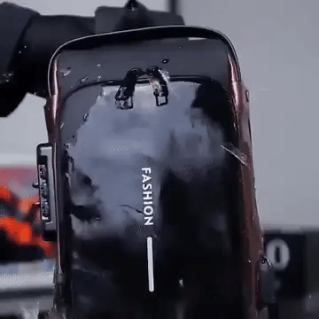 Anti-theft and waterproof shoulder strap bag with USB charging