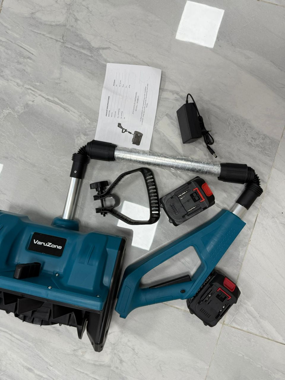 Battery powered snow shovel
