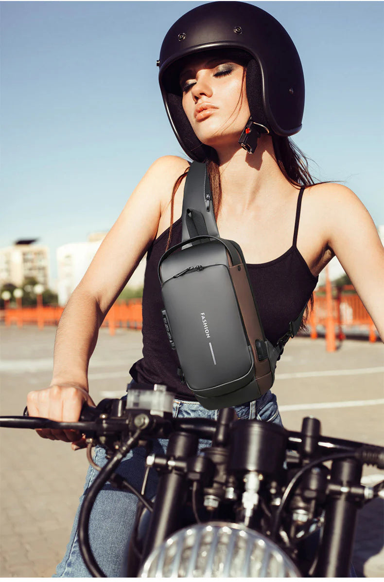 Anti-theft and waterproof shoulder strap bag with USB charging